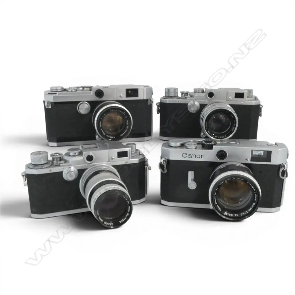 4 VINTAGE 35MM CANON CAMERAS Image 1++