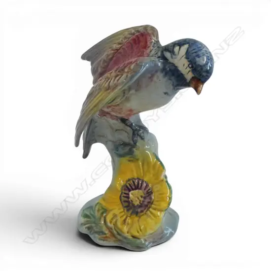 Beswick bird ‘Chickadee’ # 929. Perched on a floral decorated stump. H.140mm. 