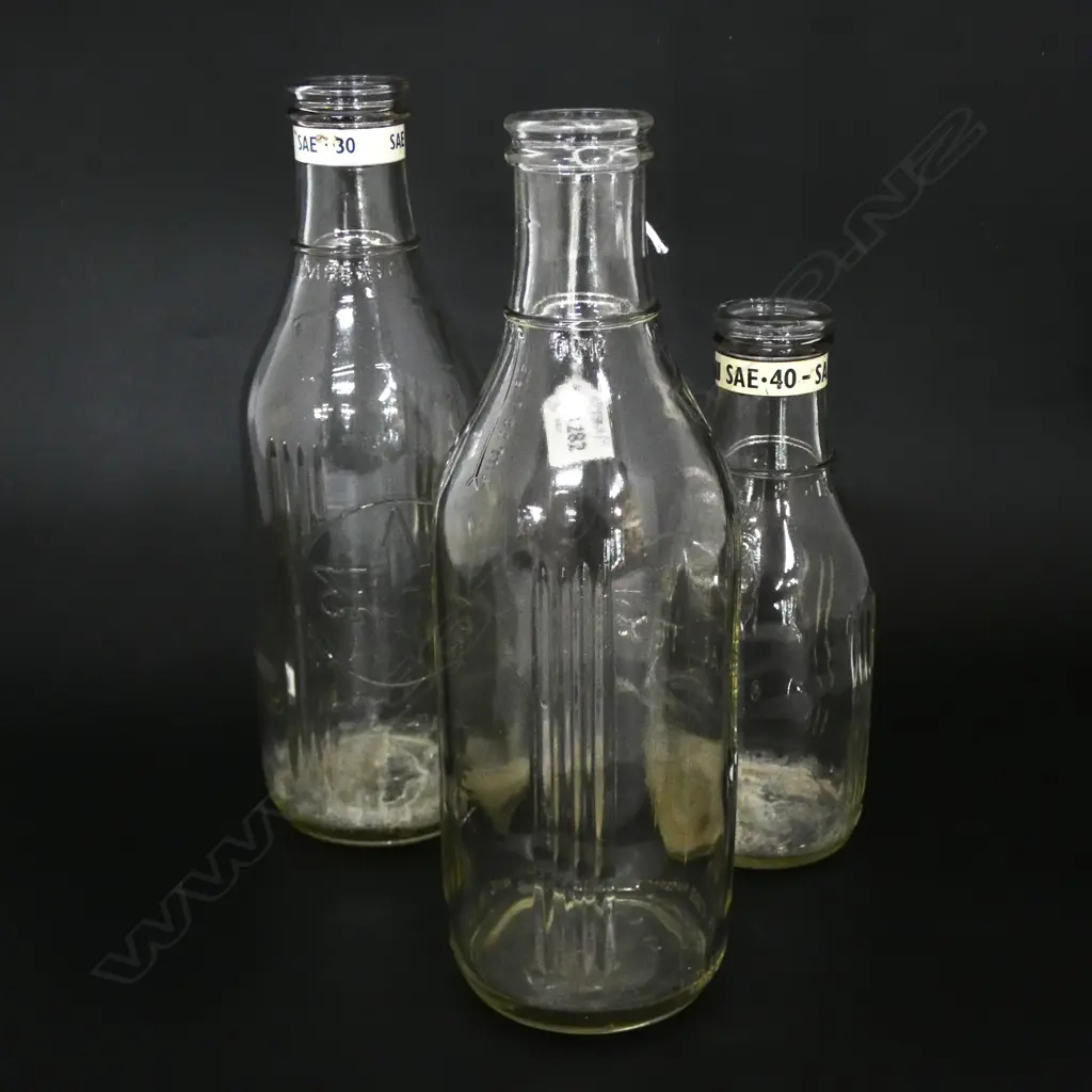 3 CALTEX GLASS BOTTLES H.290mm Image 1++