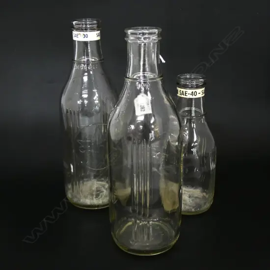 3 CALTEX GLASS BOTTLES H.290mm