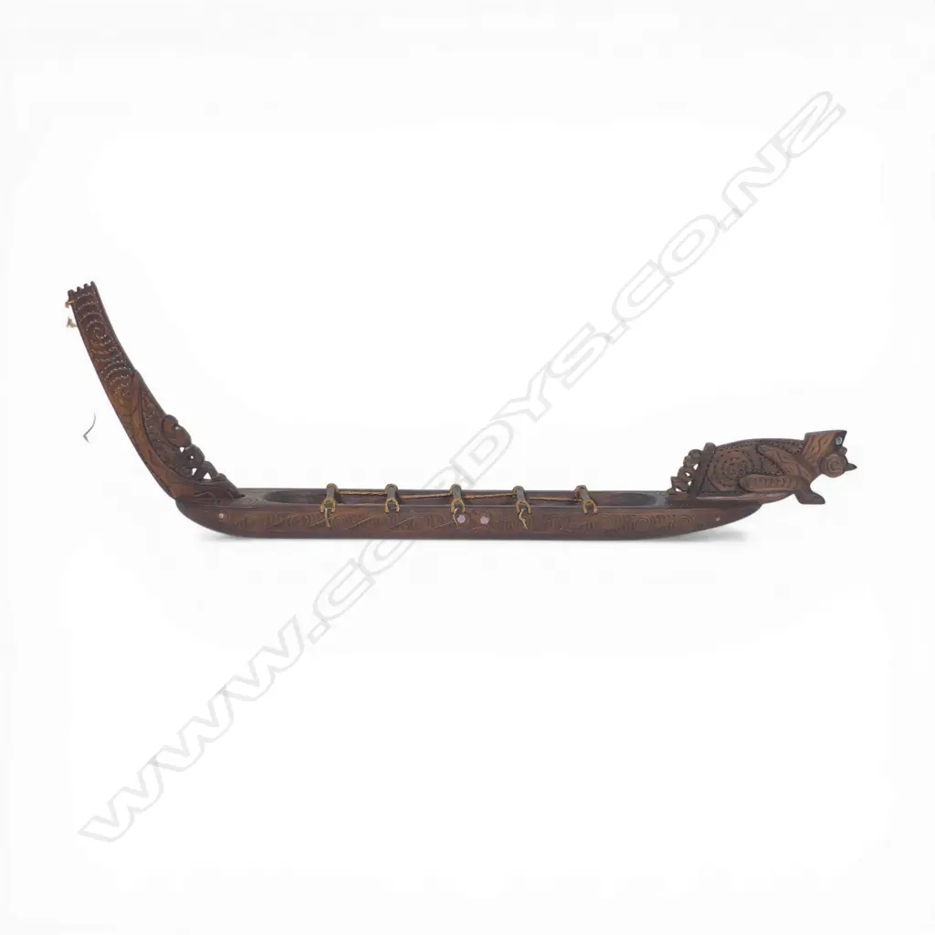 A mid/late 20thC Māori native carved wood model waka, Image 1++