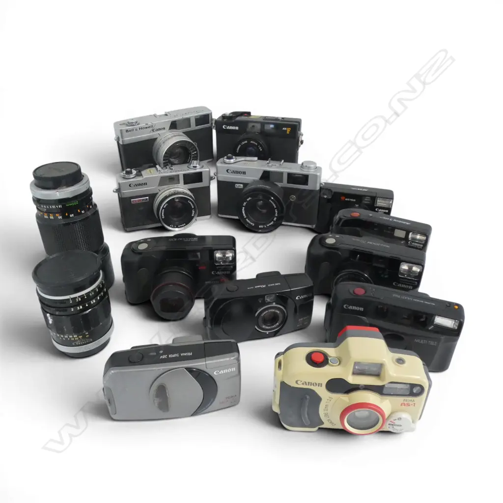 12 VINTAGE 35MM CAMERAS CANON ETC & 2 CAMERA LENSES  Image 1++