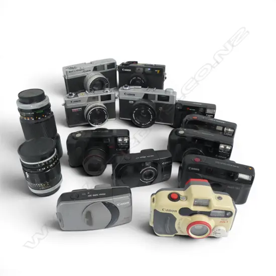 12 VINTAGE 35MM CAMERAS CANON ETC & 2 CAMERA LENSES 