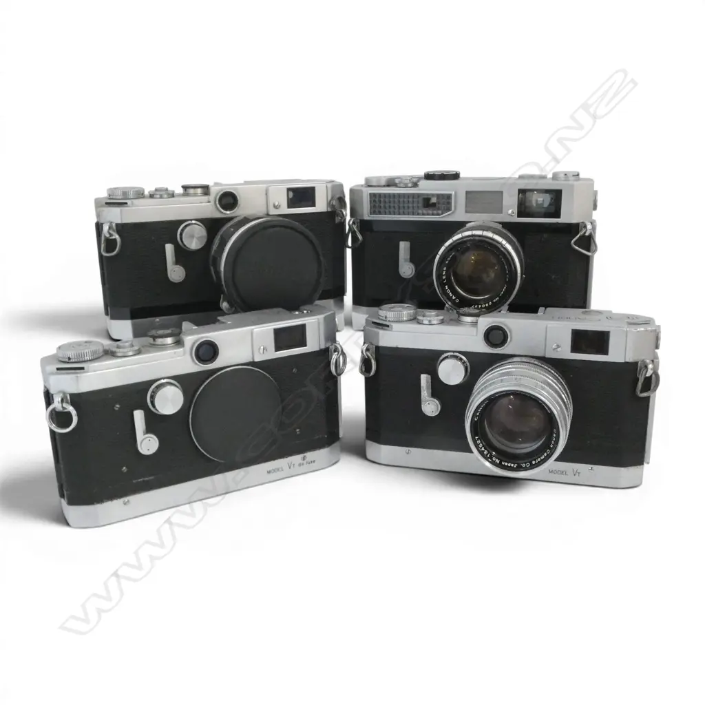 4 VINTAGE CANON CAMERAS Image 1++