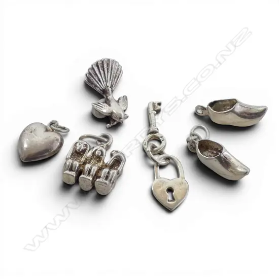 6 S/SILVER CHARMS 7.4 GMS