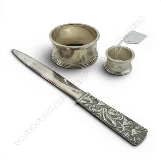 985 SILVER LETTER OPENER L.185mm 39gms + 2 860 SILVER NAPKIN RINGS 50gms