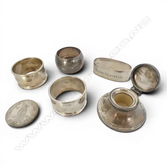 4 STG SILVER NAPKIN RINGS 72.6gms + 1949 NZ CROWN + small STG SILVER CAPSTAN INKWELL dented 