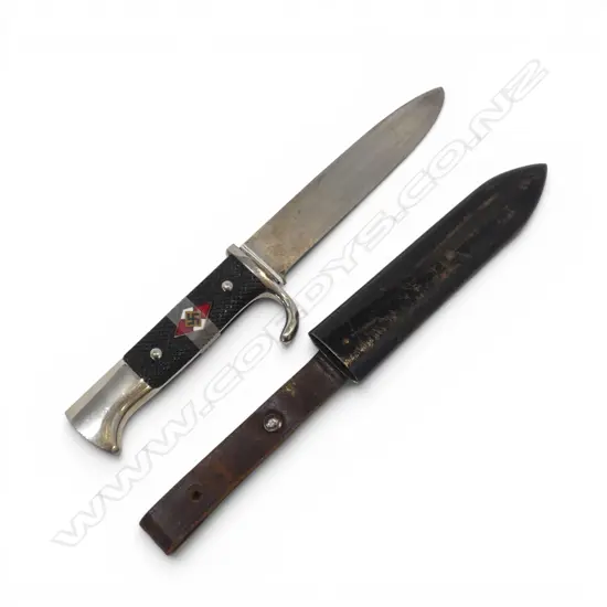 GERMAN YOUTH KNIFE 'FAHRTENMESSER' the inlaid enamel diamond loose. In ebonised scabbard. Solingen blade