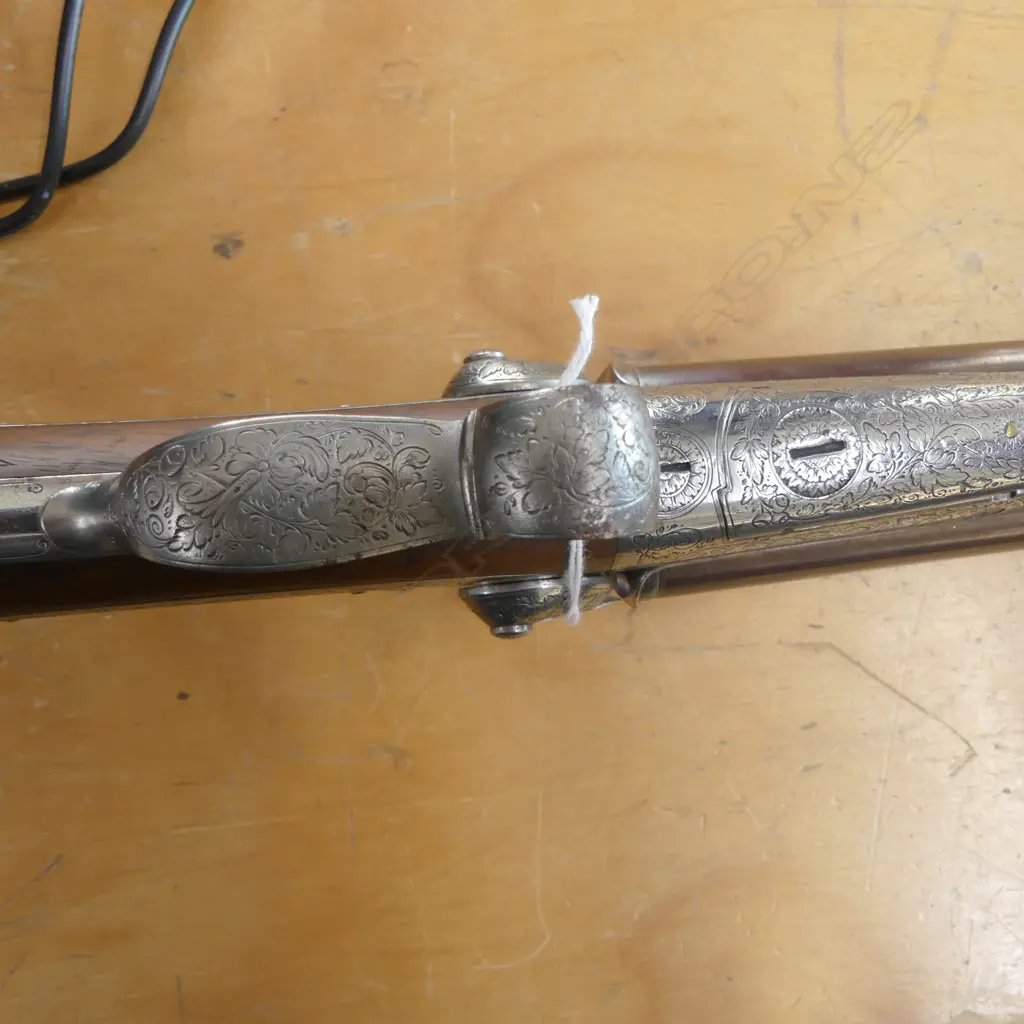 Late 19thC European double damascus barrel 16 gauge. Possibly Lefaucheux. Engraved silvered metalwork. Scrolling... Image 1++