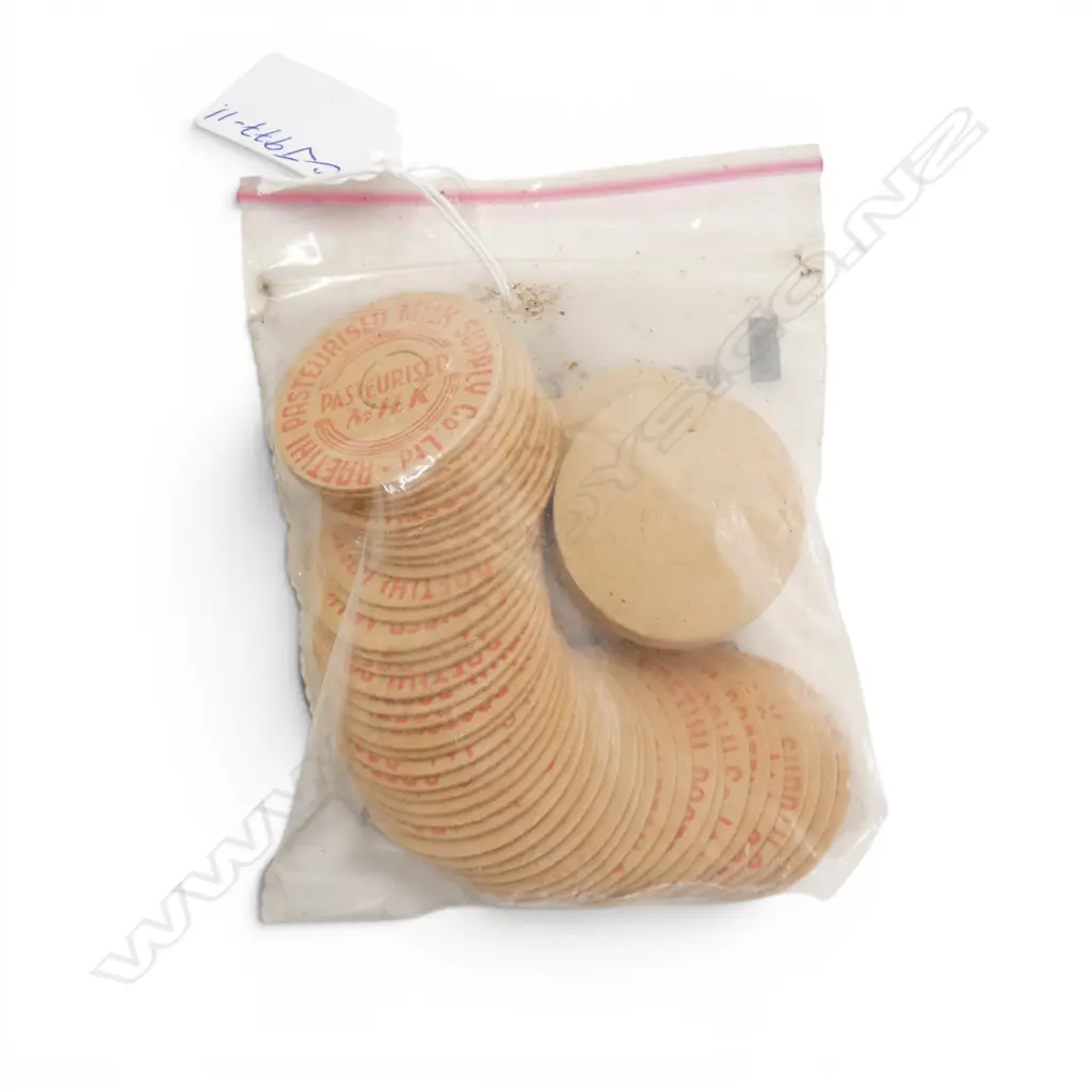 BAG of vintage MILK TOKENS 'Pasteurised Milk Supply Co. Ltd. Raetihi'. approx. 60 Image 1++