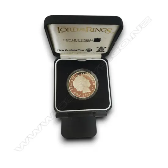 CASED 2003 N.Z. THE LORD OF THE RINGS .925 SILVER & GILT PROOF $1 COIN, 28.28gmsELIZABETH II ON THE OBVERSE