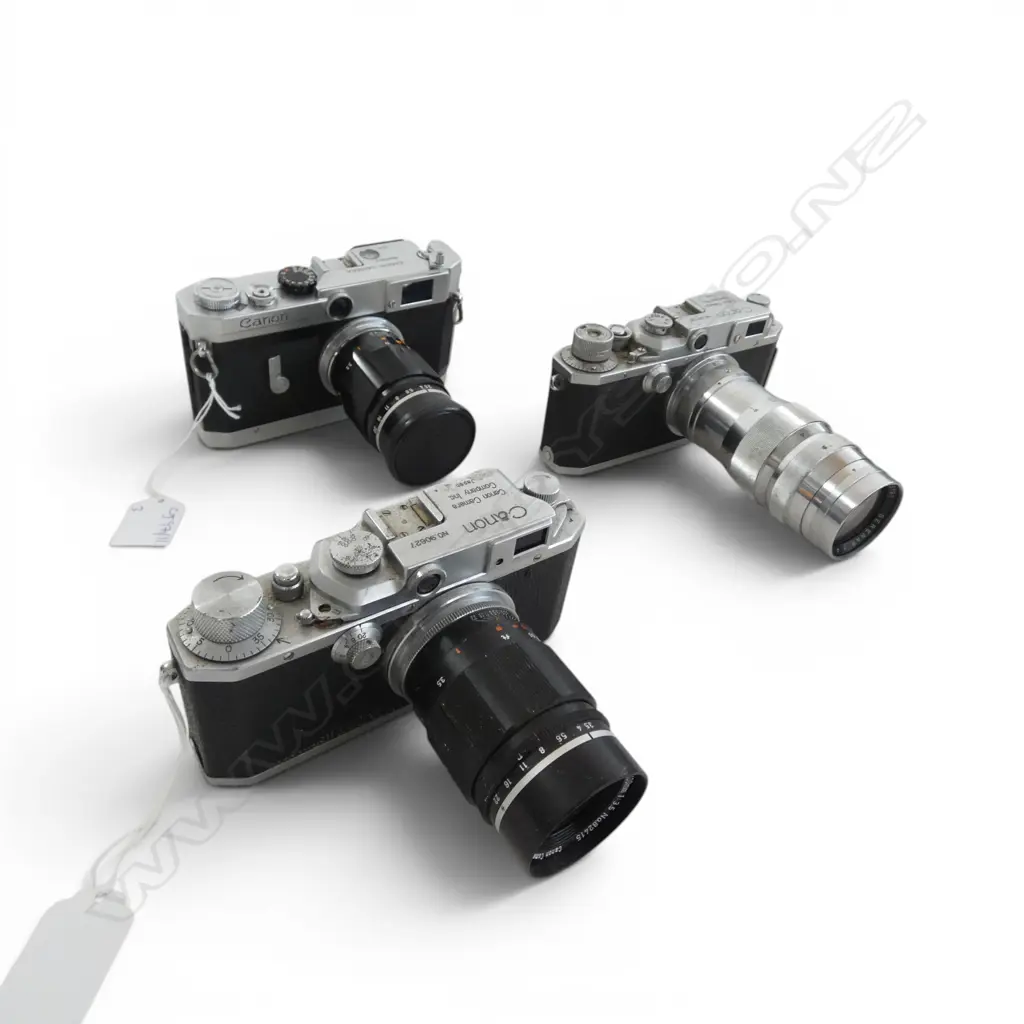 3 VINTAGE CANON CAMERAS Image 1++