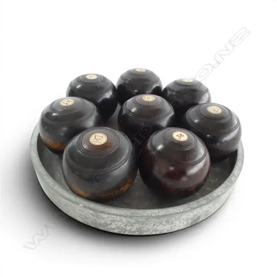 8 ANTIQUE JACQUES & SON LONDON EBONY INDOOR BOWLING BALLS ON TRAY, L.95MM