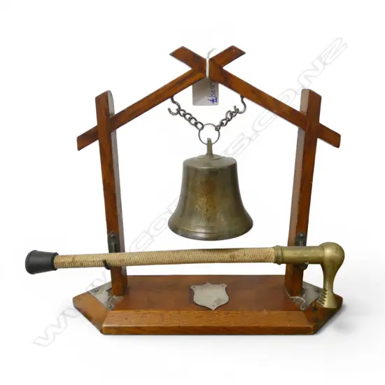 BRONZE BELL IN OAK FRAME H.240mm