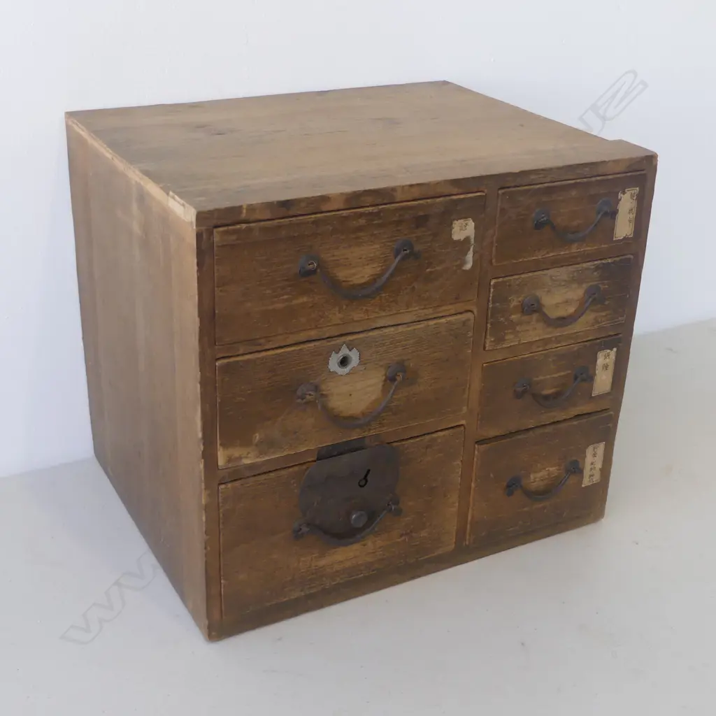 Early 20thC JAPANESE SMALL TANSU CHEST with 7 drawers. Nice old wear. Some paper labels attached. H.345mm  Image 1++