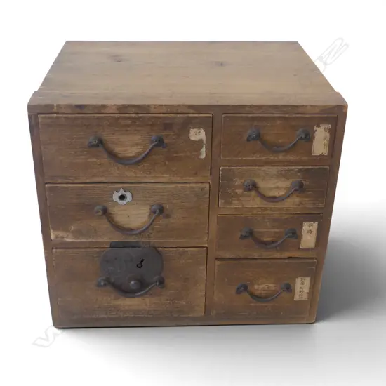 Early 20thC JAPANESE SMALL TANSU CHEST with 7 drawers. Nice old wear. Some paper labels attached. H.345mm 