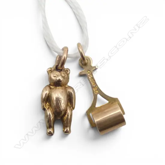 2 NOVELTY 9ct GOLD CHARMS: teddy bear & lawn roller. 1.28 gms