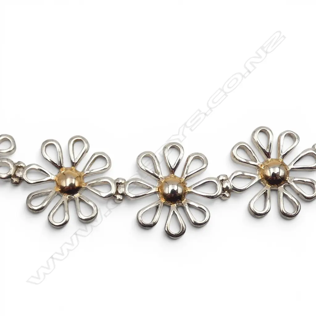 SILVER COLOURED FLOWER BRACELET 17.7GMS (not sterling silver) Image 1++