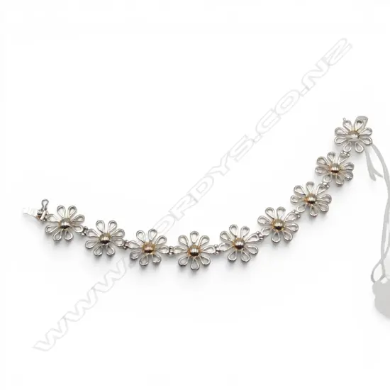 SILVER COLOURED FLOWER BRACELET 17.7GMS (not sterling silver)