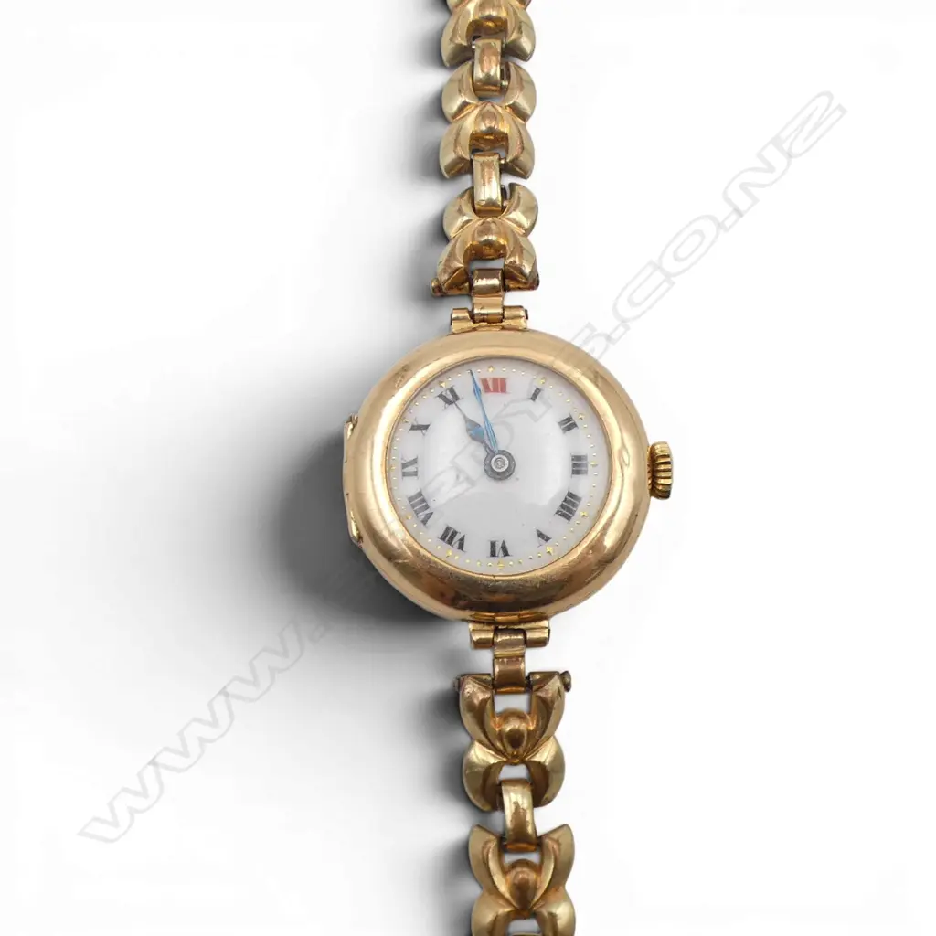 15ct GOLD CASED LADIES WRISTWATCH, ENAMEL FACE, SWISS MOVEMENT, ROLLED GOLD STRAP, 24.37gm Image 1++