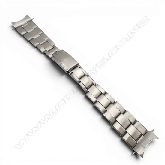 VINTAGE ROLEX STAINLESS WATCH STRAP with Rolex branded strap.