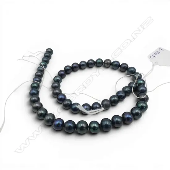 DYED FRESH WATER BLACK PEARL NECKLACE. Threaded. No clasp. New old stock. L.380mm. 8 - 9mm diameter