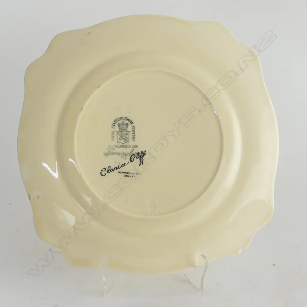 # Clarice Cliff 'Rodanthe' green colourway Leda shape plate. Dia.226mm. Small flake chip to back edge Image 1++