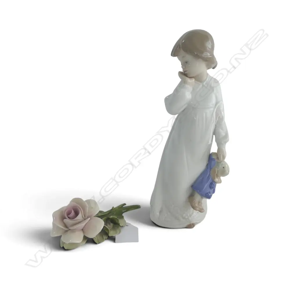 NAO FIGURINE OF A GIRL WITH TOY AND PAINTED PORCELAIN ROSE H. 210mm Image 1++