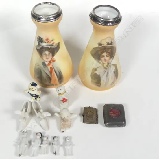 A pair of spill vases decorated with portraits of women after the illustrator Philip Boileau, silver rimmed, London 1912 by Henry Perkins & Sons. Along with a collection of mini Xmas pudding and cake dolls; a mini English Dictionary and mini Napoleonic portraits locket.