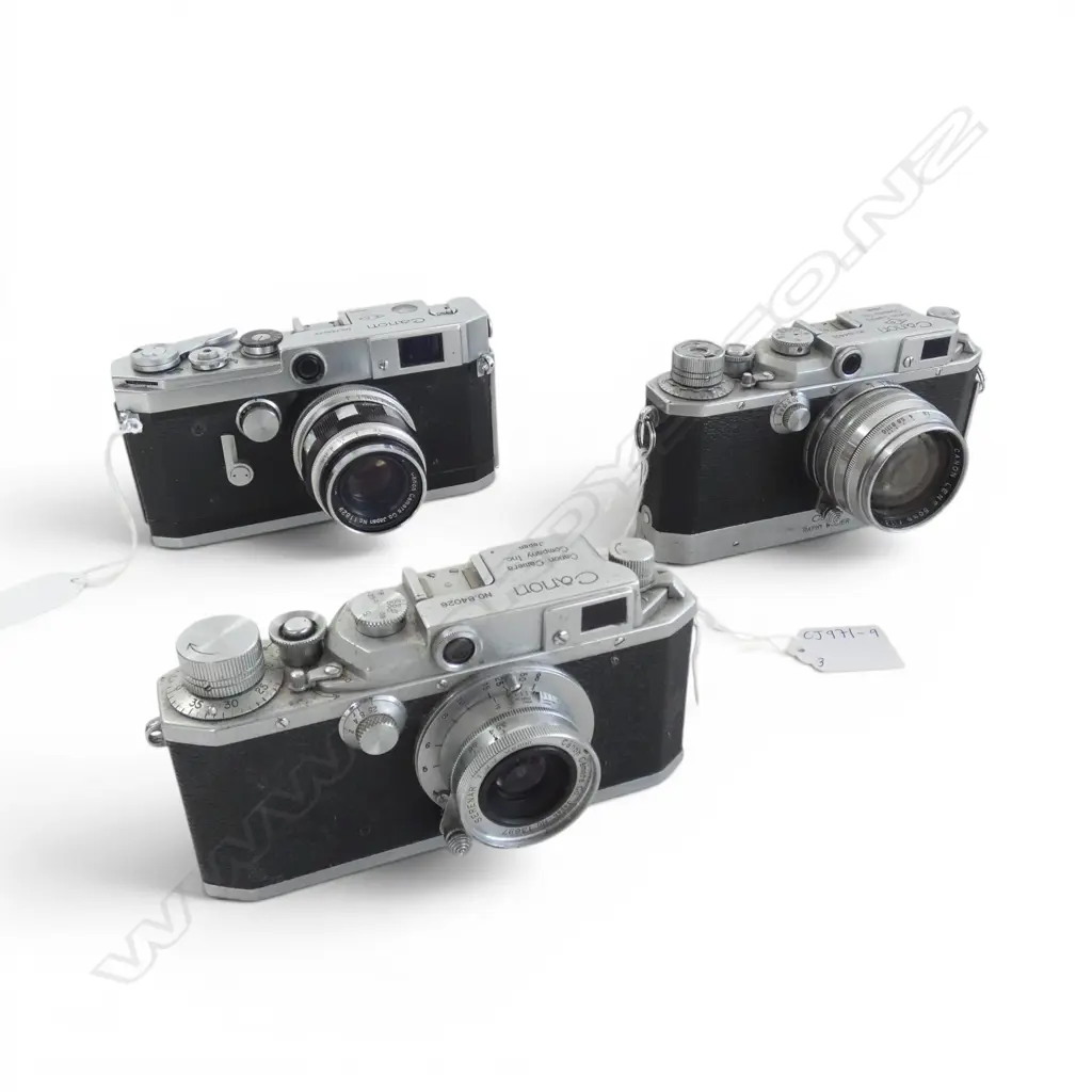 3 VINTAGE CANON CAMERAS Image 1++