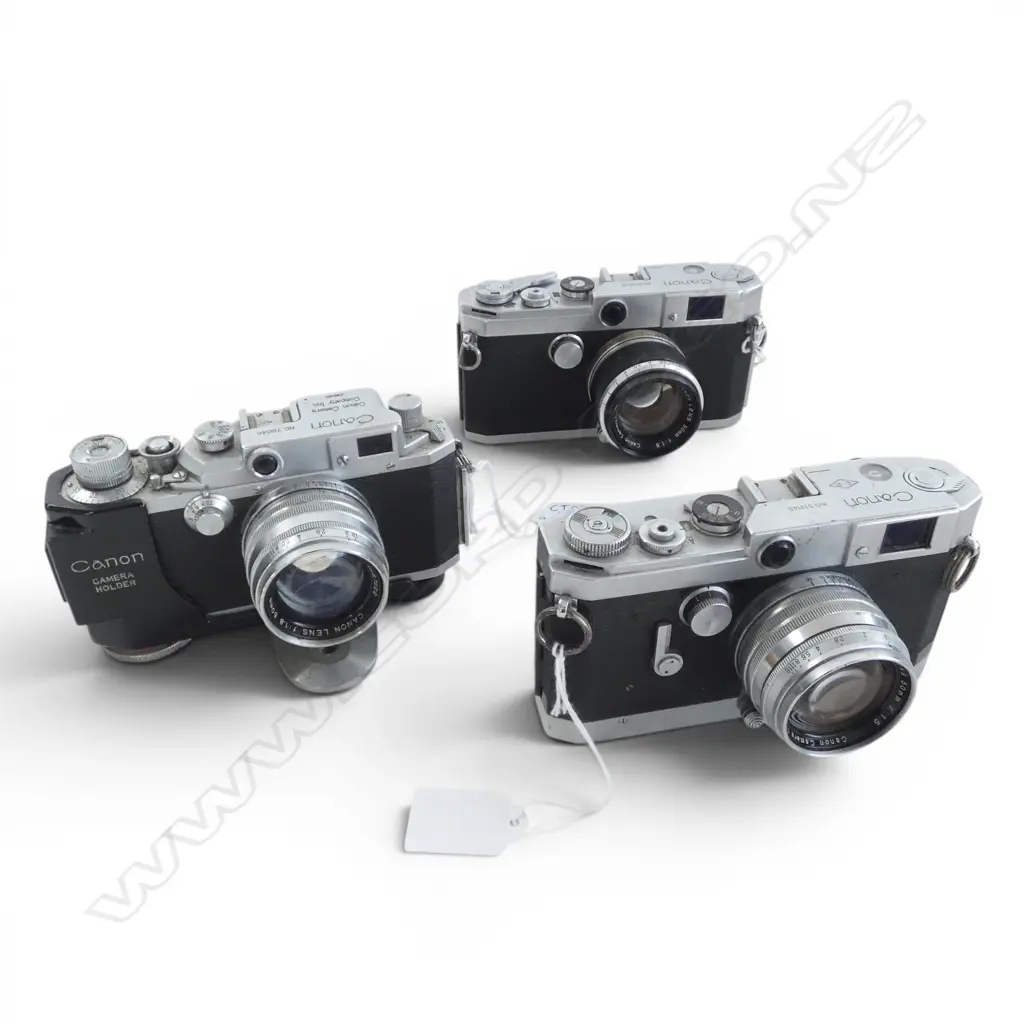 3 VINTAGE CANON CAMERAS Image 1++