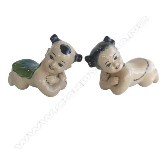 VINTAGE CHINESE HAND-PAINTED PORCELAIN CRAWLING BABY FIGURE OFTEN REFERRED TO AS A "PIANO BABY" 450 x 250H mm