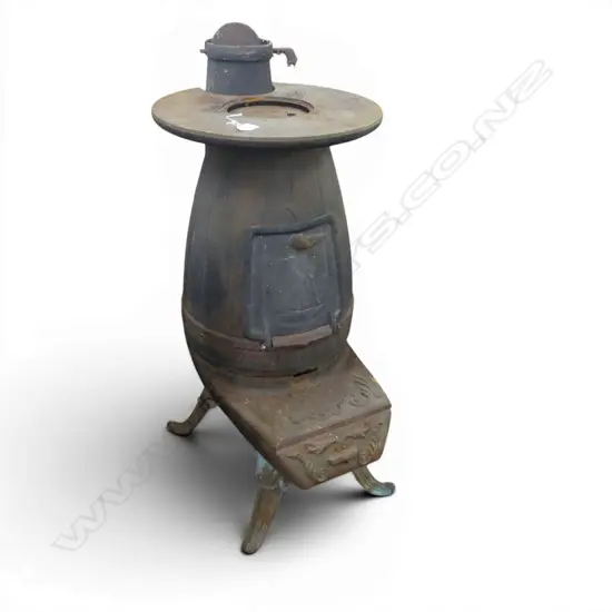 'SCHOONER' POT BELLY CAST IRON WOODBURNER with wet back ports. The internal grille broken