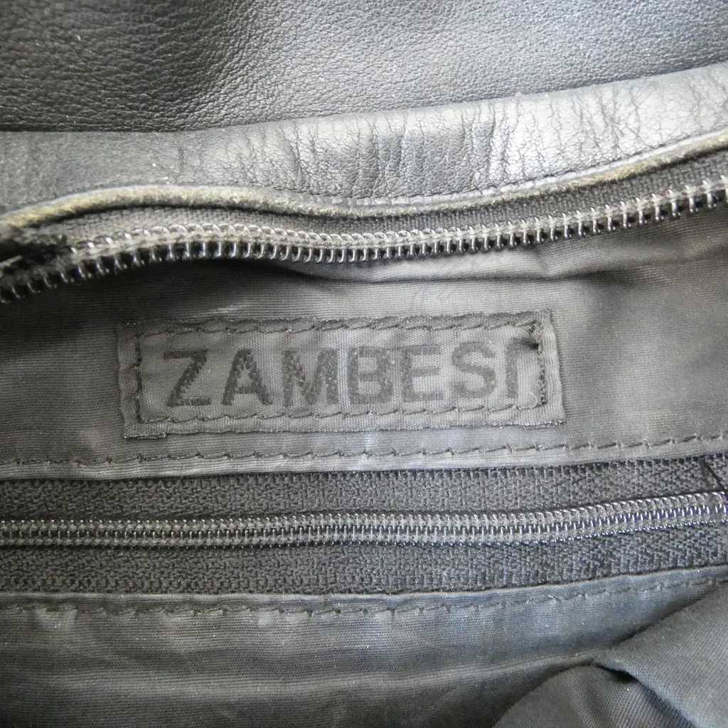 2 BLACK LEATHER HAND BAGS, ONE ZAMBESI (STRAP REPAIRED), OTHER POSSIBLY BUT NO LABEL (LINING WORN) Image 1++