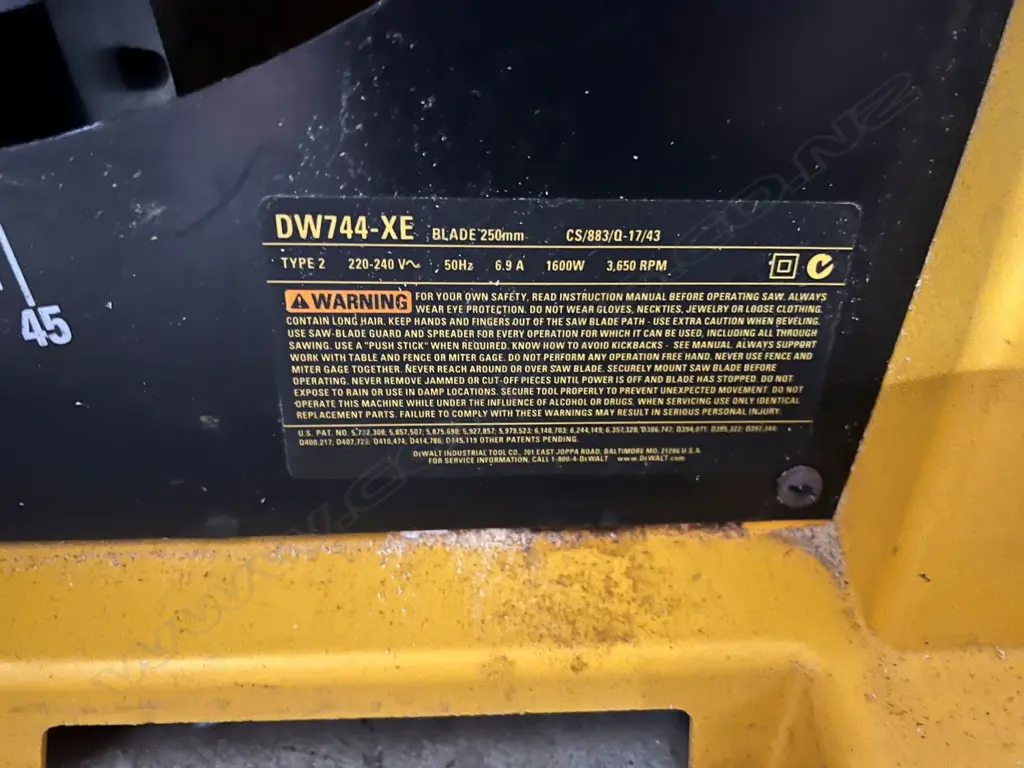 DeWalt DW744-XE ELECTRIC BENCH SAW 250mm blade 1600W. Paint flaking to top. 675 x 565 x 330mm. Image 1++