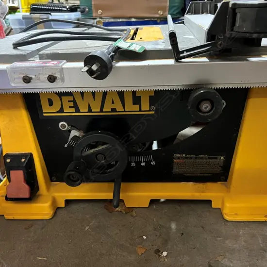 DeWalt DW744-XE ELECTRIC BENCH SAW 250mm blade 1600W. Paint flaking to top. 675 x 565 x 330mm.