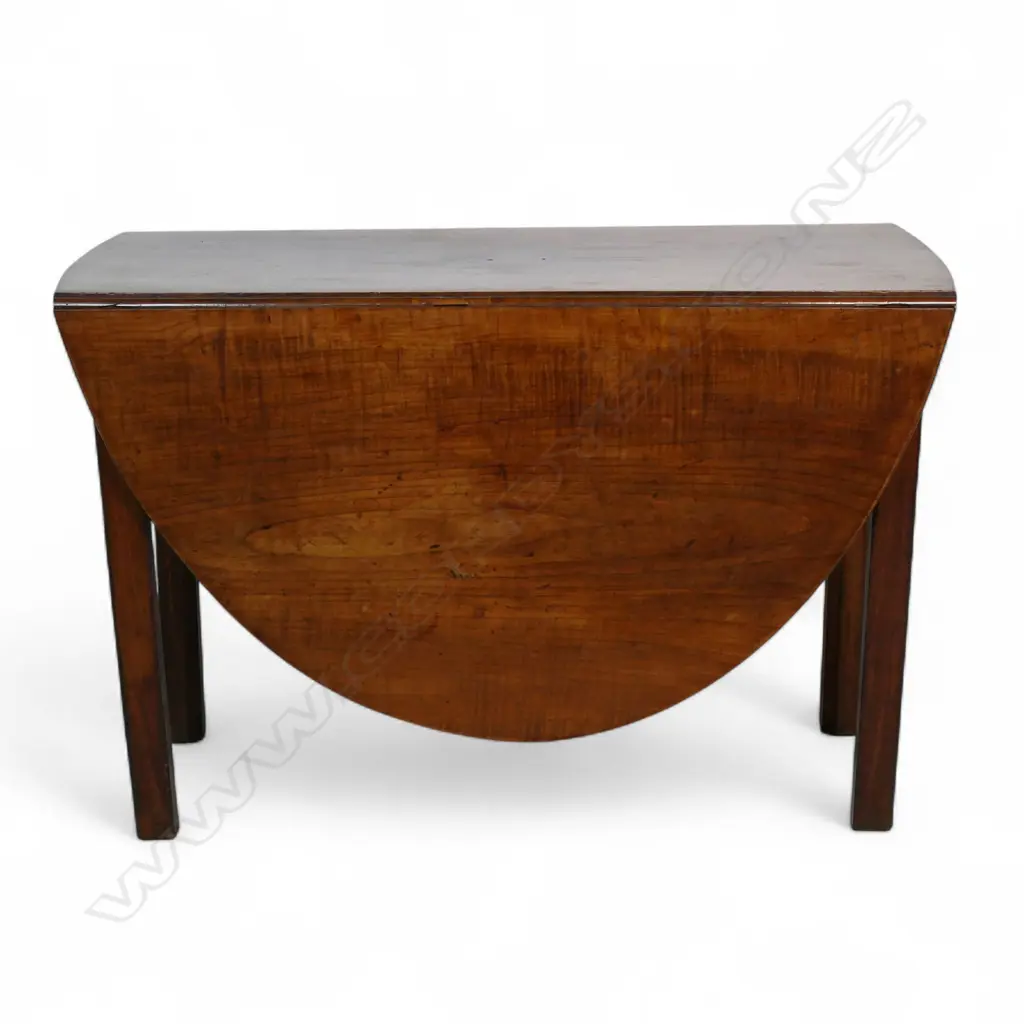 An English c.1770 oval flame mahogany drop leaf table, Image 1++