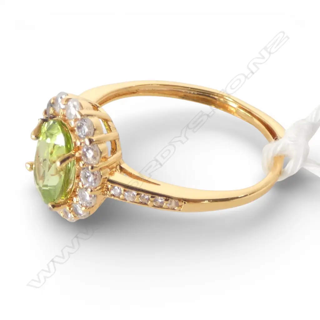 PERIDOT & CZ DRESS RING, GILT FINISH, AIG REPORT, one cz discoloured, adjustable band  size Image 1++