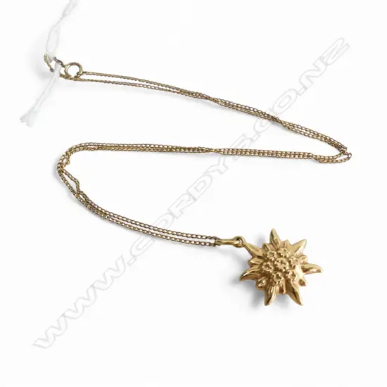 18CT SUN PENDANT (1.2gms) ON SILVER GILT CHAIN