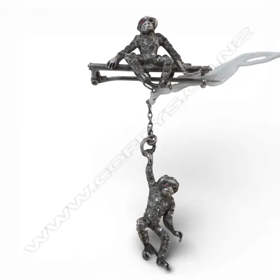 STG SILVER 2 MONKEY BROOCH set w faux diamonds. 1 hanging from the other by a chain