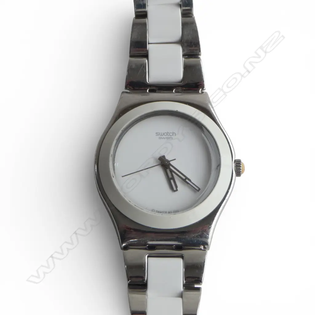 SWATCH DESIGNER DRESS WATCH IN STAINLESS STEEL AND WHITE CERAMIC. GOING WITH NEW BATTERY Image 1++