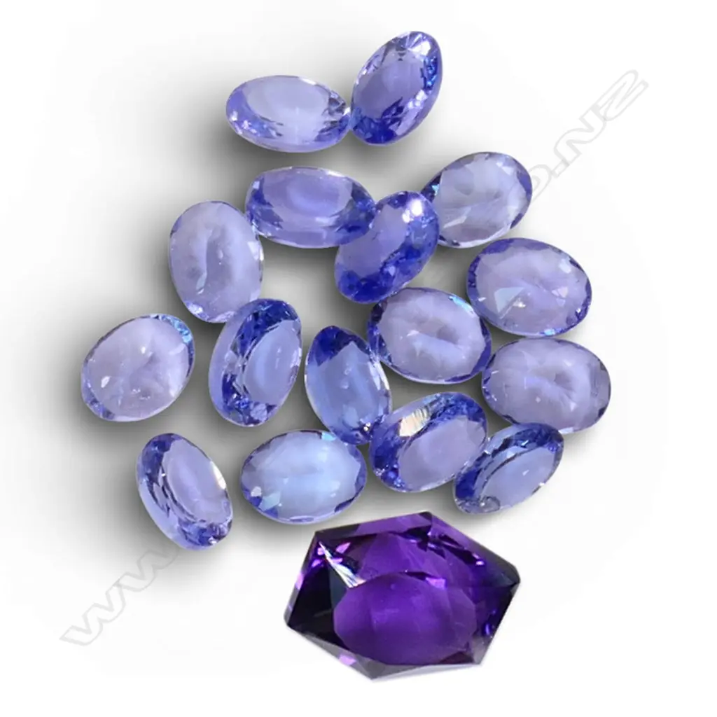 FANCY CUT UNSET AMETHYST & 16 sml TANZANITE OVALS, 2.86ct Image 1++