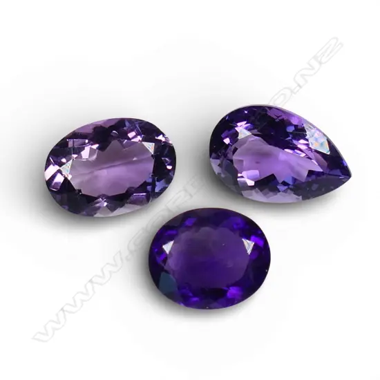 3 LOOSE AMETHYSTS, OVAL & PEAR CUT