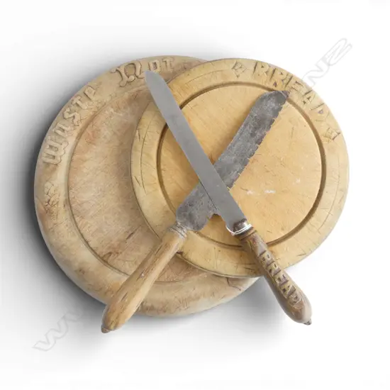 2 VINTAGE CIRCULAR WOODEN BREAD BOARDS with KNIVES carved 'Bread' to handles