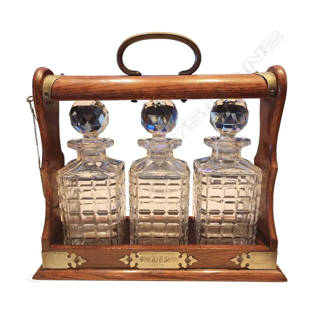 1897 TANTALUS WITH THREE CUT-GLASS DECANTERS Image 1++