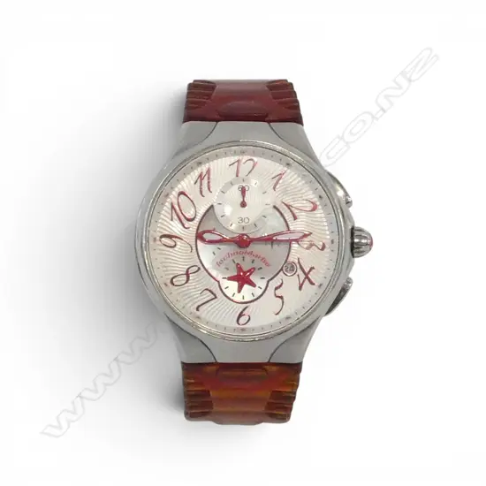 TECHNOMARINE TM STAR COLLECTION WATCH FEATURES A  WHITE DIAL WITH RED STAR ACCENTS