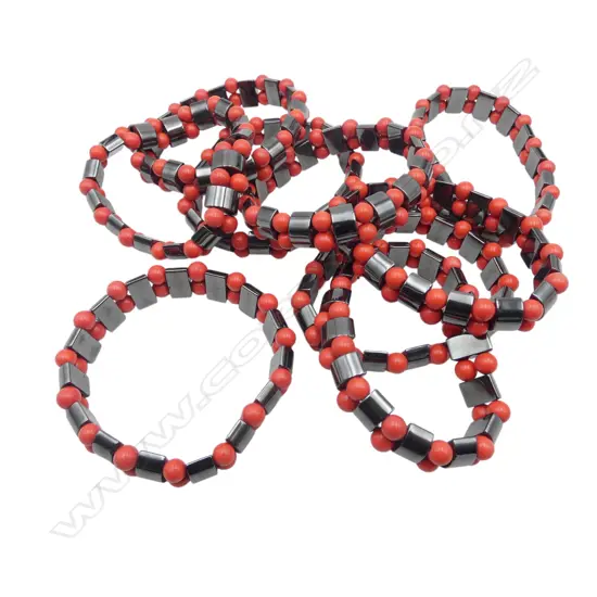 9 hematite & red coral? bead expanding bracelets. New old stock.