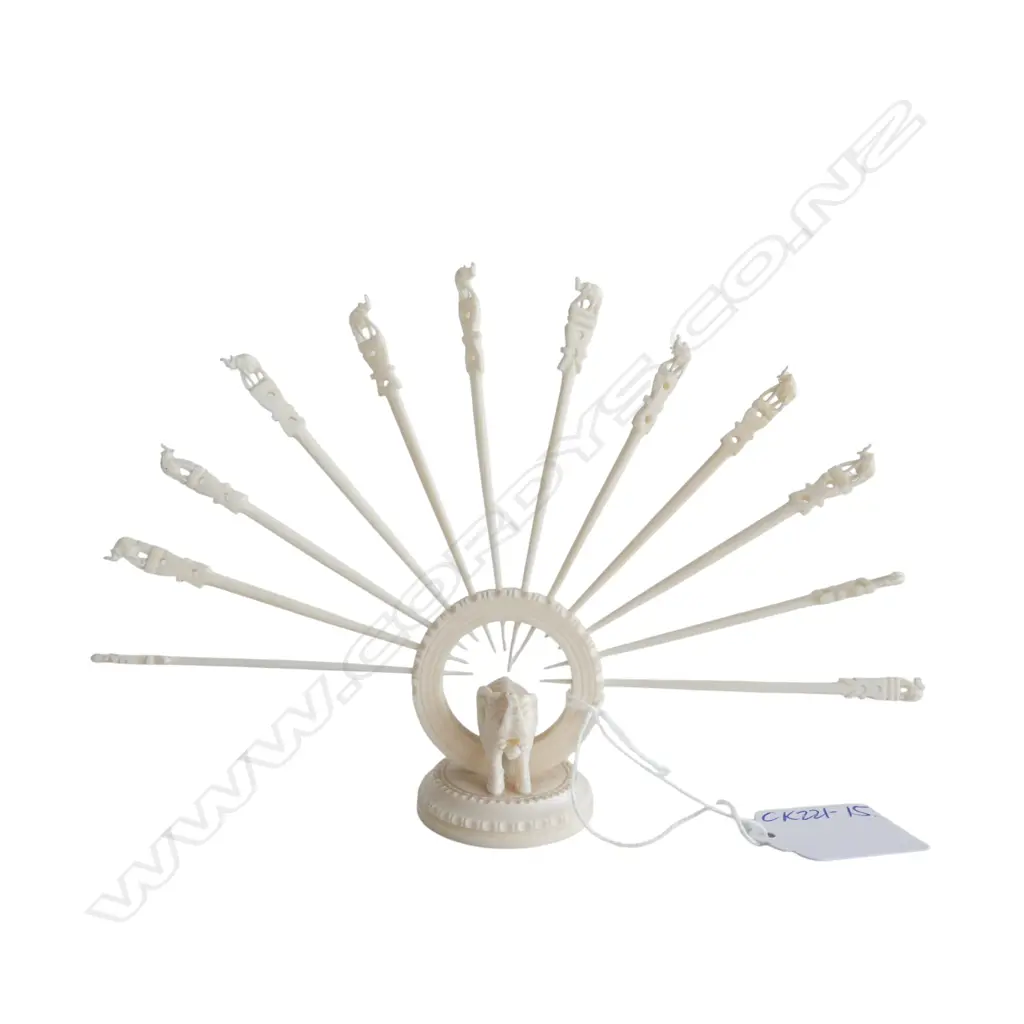 Set 12 Indian carved ivory swizzle sticks in ring stand with elephant base. H.130mm Image 1++