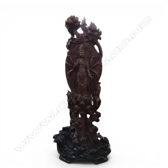 TALL CHINESE CARVED WOOD 8 ARM GUANYIN SCULPTURE on ebonised base