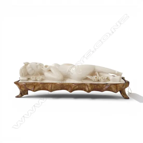 CARVED IVORY RECLINING NUDE FIGURE on carved wood stand L.220mm